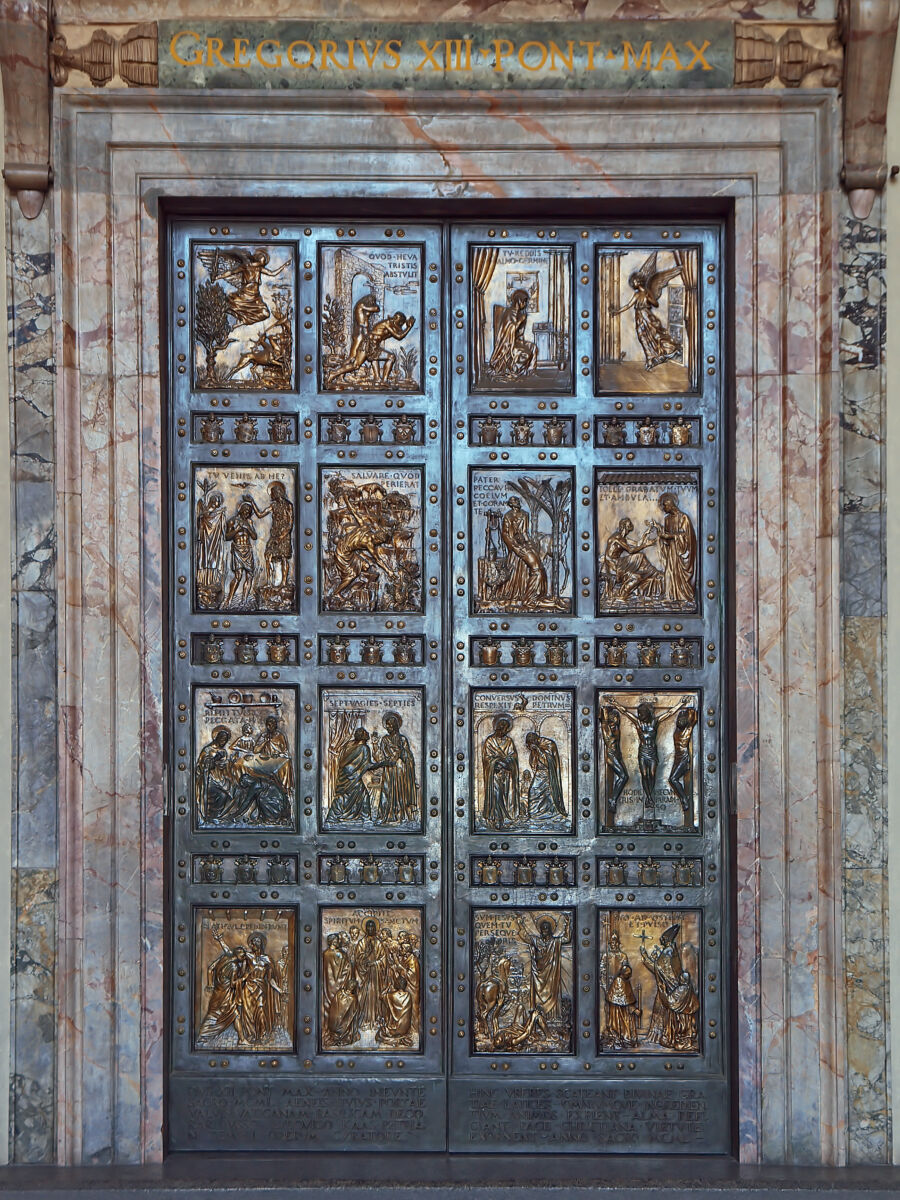 Bronze Holy Door entrance to St. Peter Basilica in Vatican City, Rome, Italy