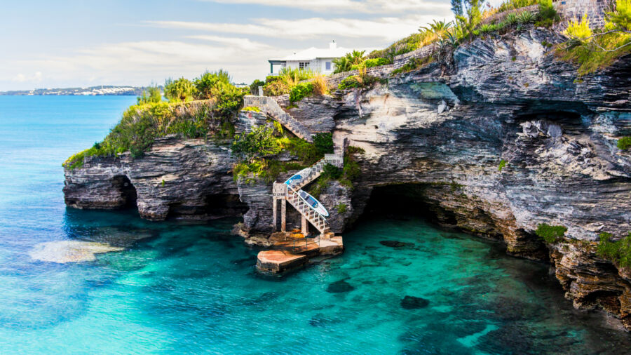 Beautiful panorama of Horseshoe Bay Beach and Deep Bay Beach, highlighting the serene coastline and inviting ocean waves