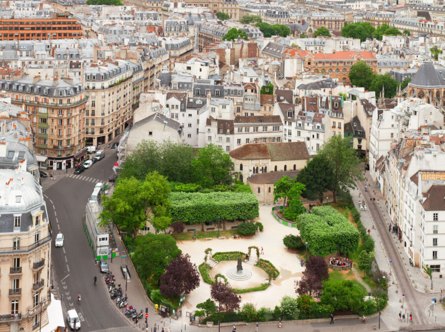 Vibrant street scene in Quartier Latin, Paris, showcasing historic architecture