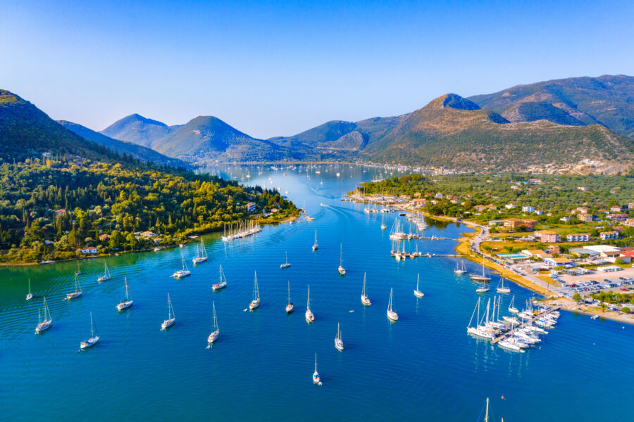 Aerial view of Nidri port in Lefkada, Greece, showcasing its vibrant waterfront and scenic surroundings