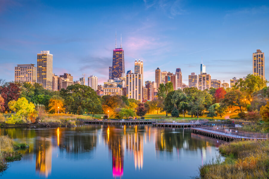 The skyline of Lincoln Park in Chicago, featuring a blend of contemporary buildings and lush greenery