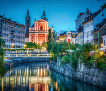 Evening view of the bridge and Ljubljanica river in the city center. Ljubljana, capital of Slovenia.