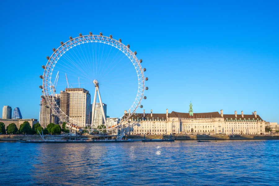 The London Eye stands majestically on the banks of the River Thames, offering stunning views of the city skyline