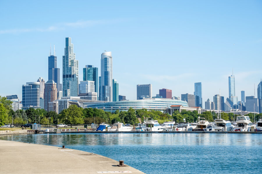 Scenic cityscape from a bike trail at McCormick Place, featuring Lake Michigan and a marina in Chicago, Illinois 