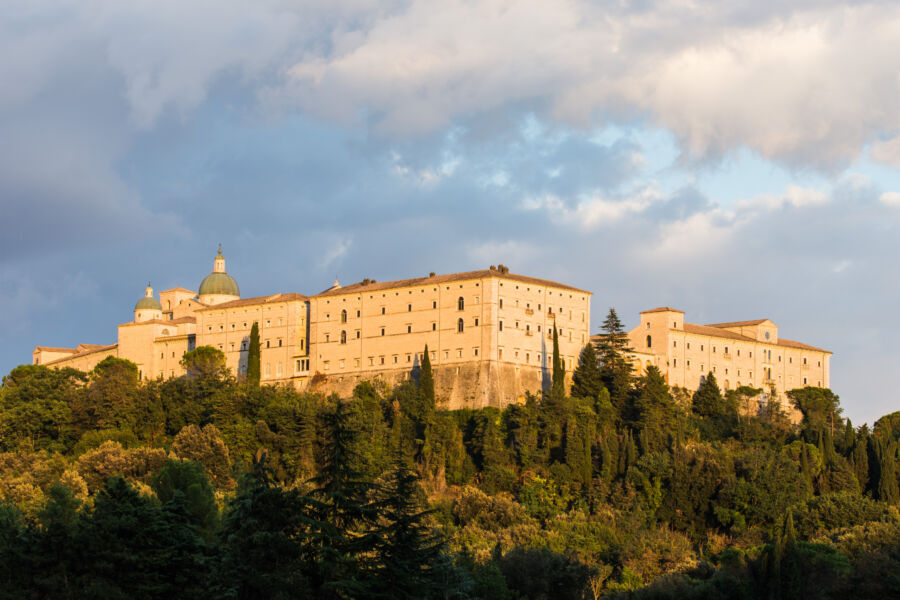 Scenic view of Montecassino Abbey in Cassino, Lazio, Italy, showcasing its architectural grandeur and surrounding nature