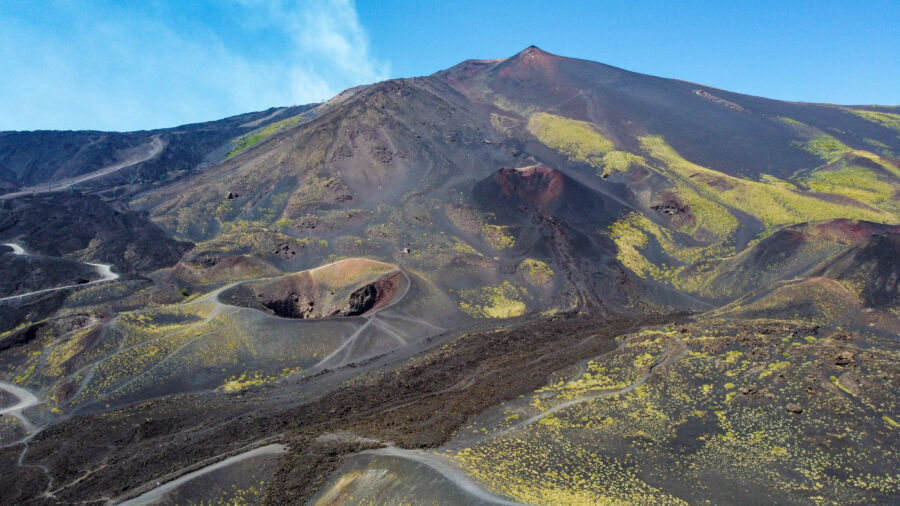 Aerial view of Mount Etna in Sicily, Italy, showcasing the volcano's majestic landscape from a drone perspective