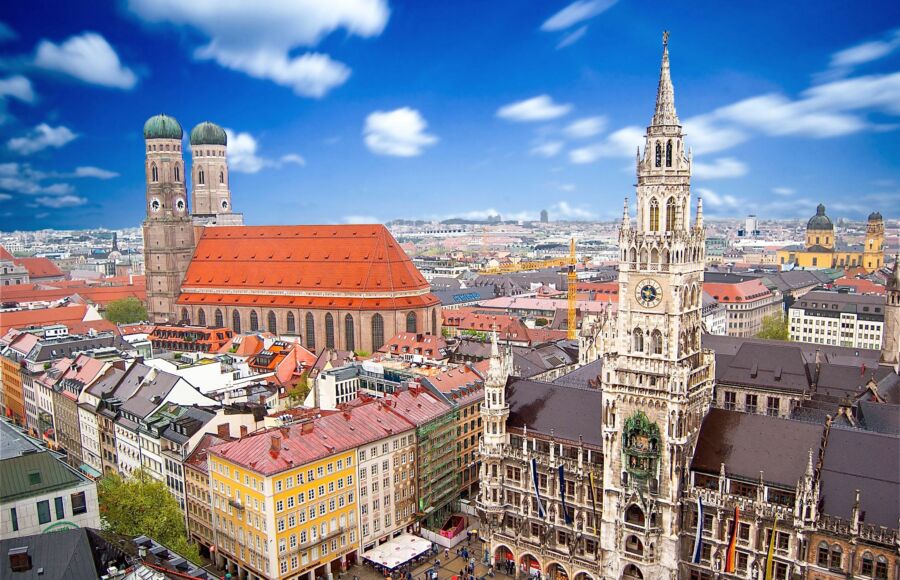 Aerial view of Munich's skyline featuring the Marienplatz town hall amidst the cityscape of Germany