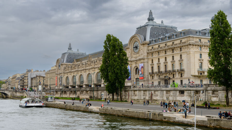 The stunning exterior of the Musée D'Orsay in Paris, showcasing its iconic architecture and beautiful surroundings