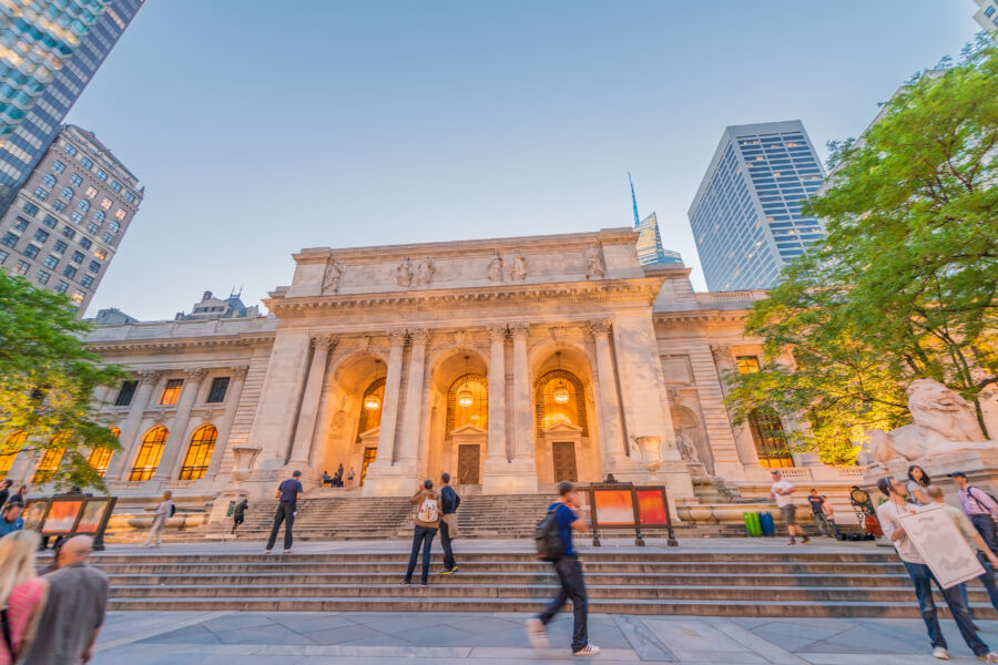 Sunset view of the Public Library on Fifth Avenue, Manhattan, showcasing the building's architecture