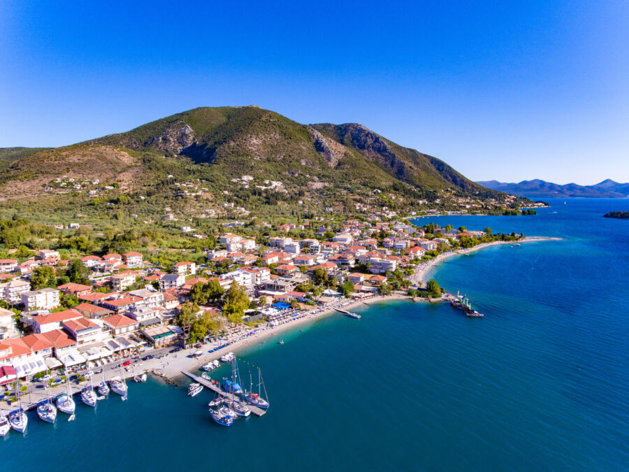 Aerial view of Nidri town on Lefkada Island, Greece, showcasing its scenic beauty and vibrant coastal landscape