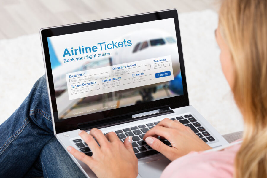 Laptop screen showcasing an online flight booking platform