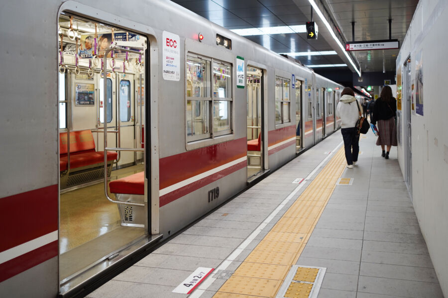 Exterior view of Osaka Midosuji line metro at a station in Osaka, Japan