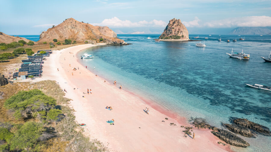 Panoramic aerial view of the pink beach on Padar Island, Komodo, Indonesia, highlighting its unique beauty