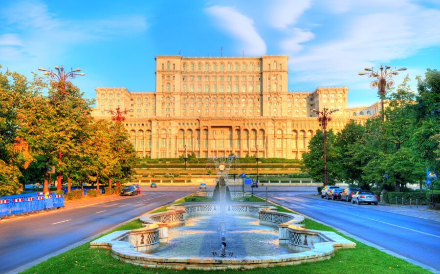 Palace of Parliament landmark  illuminated at sunrise in Bucharest, Capital of Romania in Eastern Europe