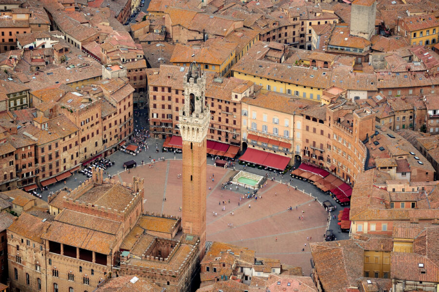 The Palio di Siena event captures the excitement of horse racing and traditional festivities in the picturesque city of Siena, Italy