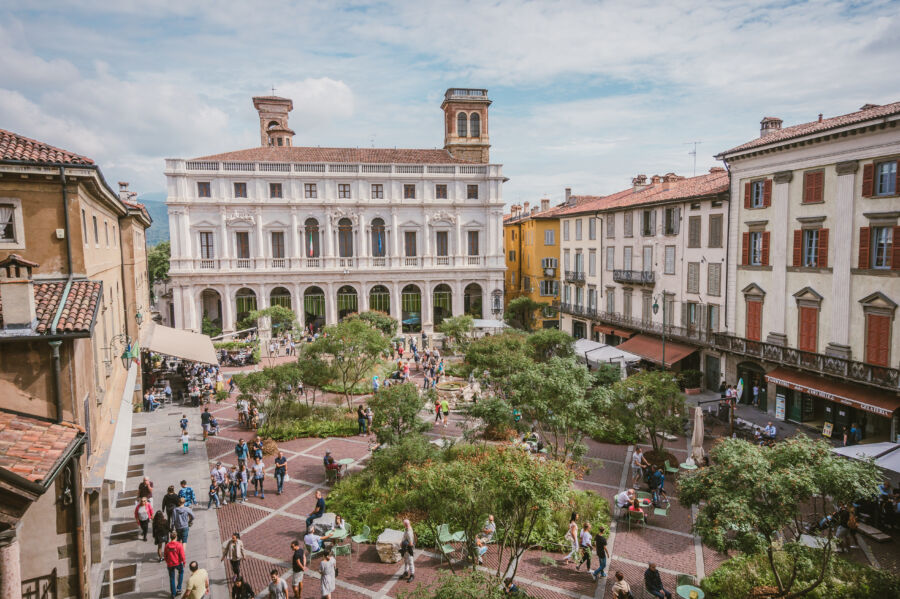 The historic Piazza Vecchia in Bergamo's Citta Alta, a central gathering place surrounded by stunning architecture