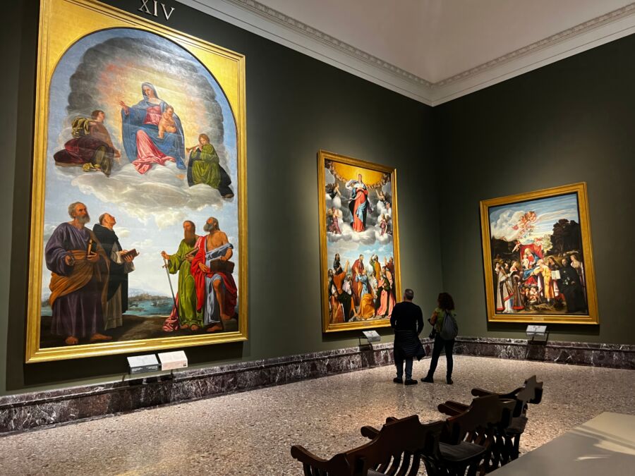 Interior view of Pinacoteca di Brera in Milan, Italy, featuring an art exhibit with classic masterpieces on display