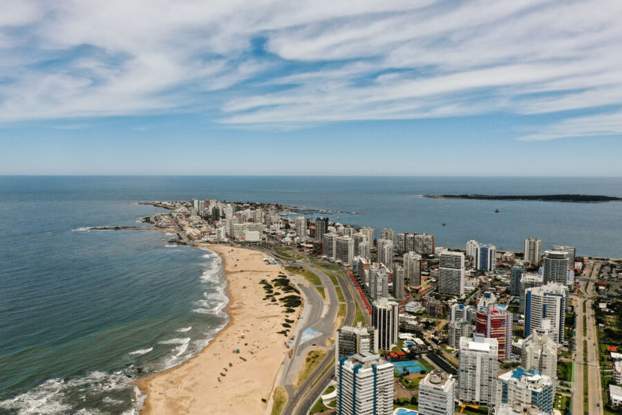 Aerial view of Punta del Este's Brava Beach in Uruguay, showcasing its stunning coastline and vibrant blue waters