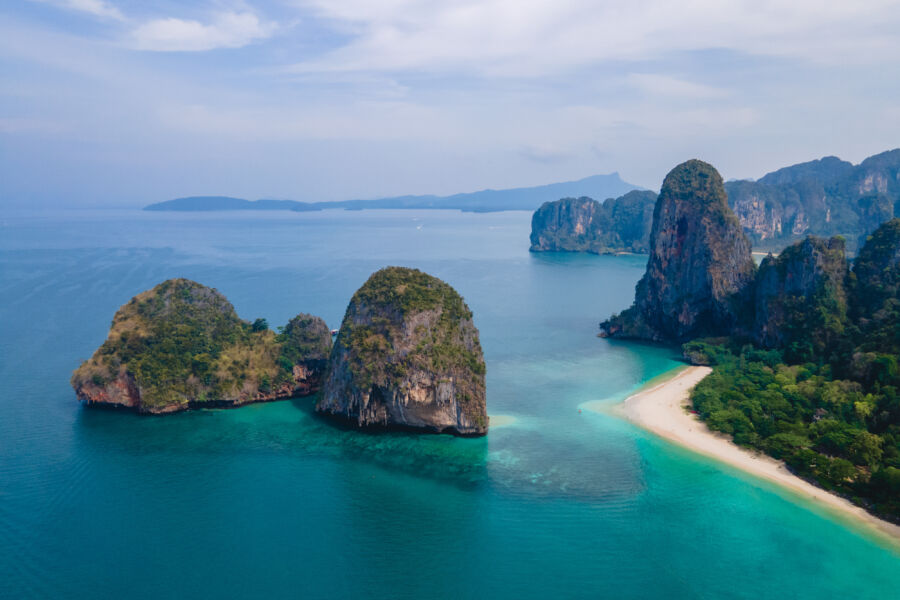 Scenic aerial view of Railay Beach in Krabi, Thailand, showcasing its stunning tropical landscape and crystal-clear waters