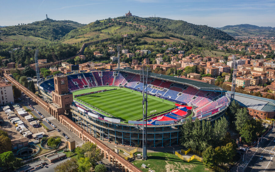 Aerial view of Renato Dall'Ara Stadium, showcasing its unique architecture in Bologna, Italy, surrounded by urban landscape