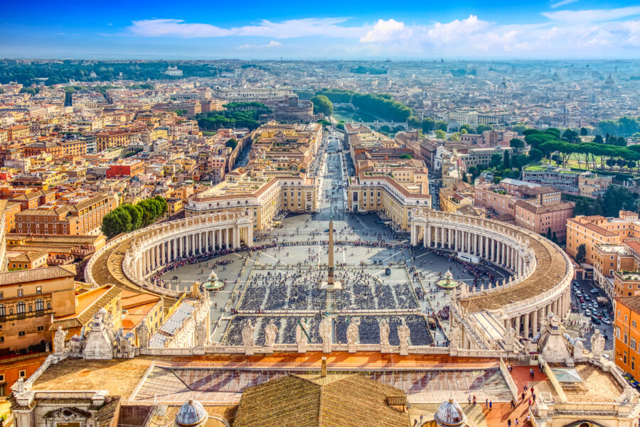 Famous Saint Peter's Square in Vatican and aerial view of the Rome city during sunny day