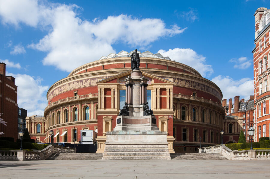 Exterior view of the Royal Albert Hall in London, showcasing its iconic architecture and grandeur as a concert venue