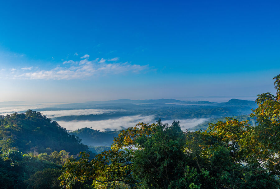 Scenic clouds hovering over the skyline, captured from the summit of Sajek Hill, offering a breathtaking vista.
