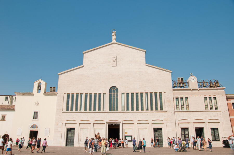 Exterior of San Pio Church in San Giovanni Rotondo, Italy, highlighting its unique design and tranquil surroundings