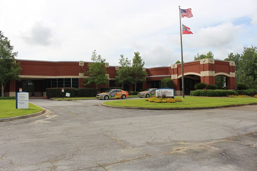 Front view of Savannah Technical College's Crossroads Technology Campus, showcasing modern architecture and landscape
