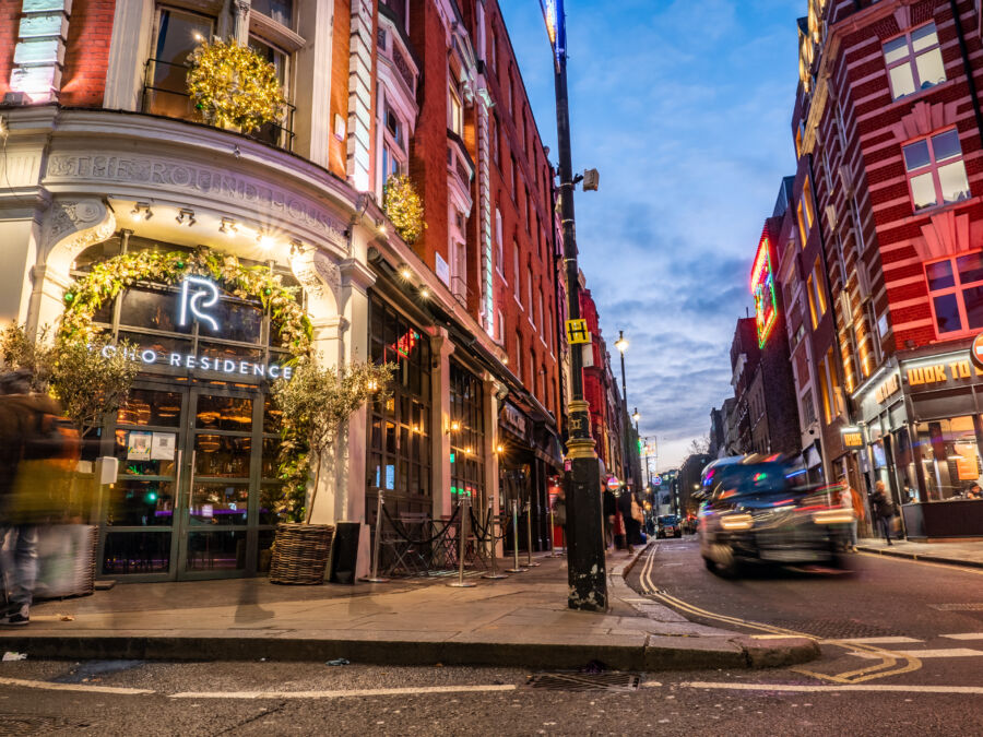 Wide view of Soho, London, highlighting its lively bars and restaurants in a once red light district now full of nightlife