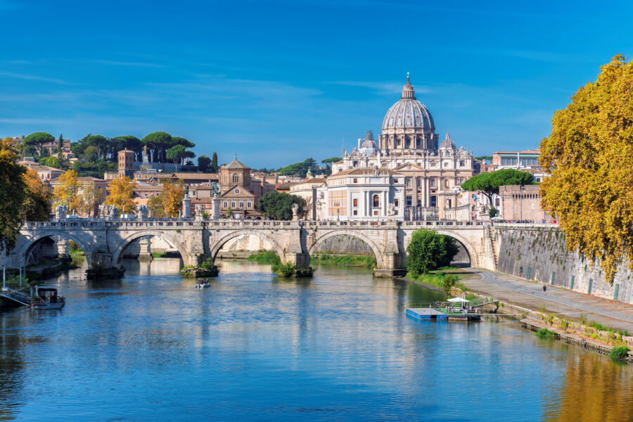 Sunny autumn day in Rome, showcasing the skyline with St. Peter's Basilica in the Vatican