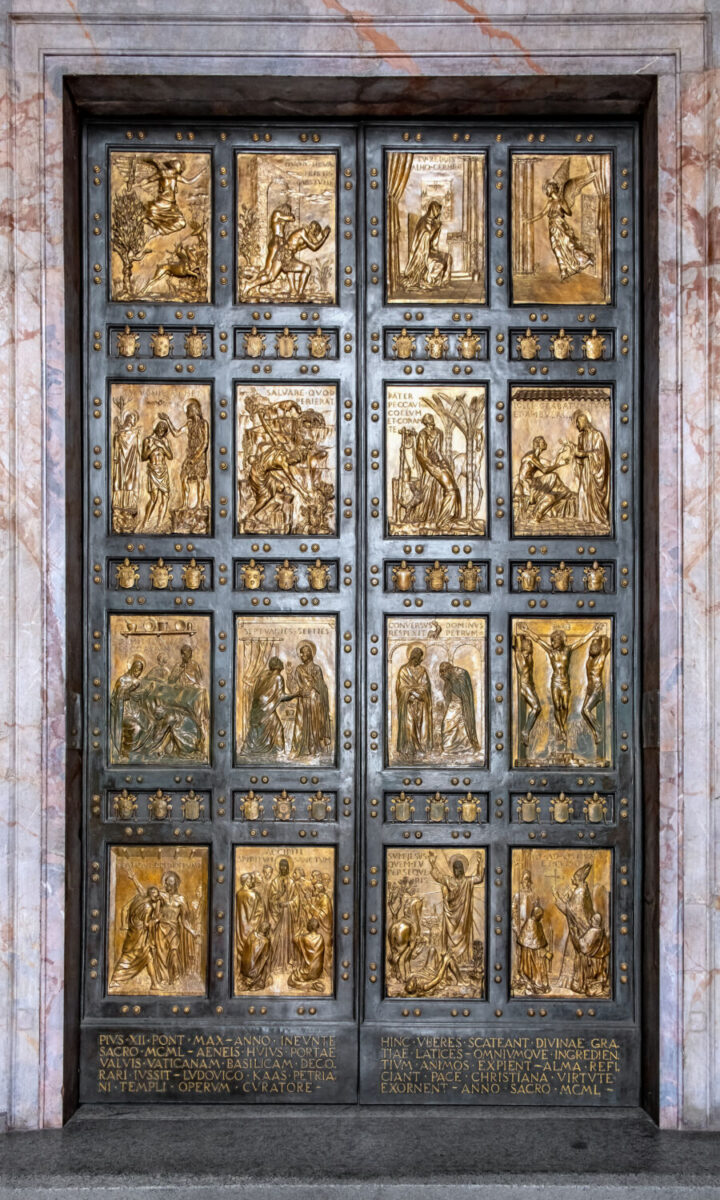 Bronze Holy Door by Vico Consorti, a symbolic entrance to St. Peter Basilica in Vatican City, Rome, Italy