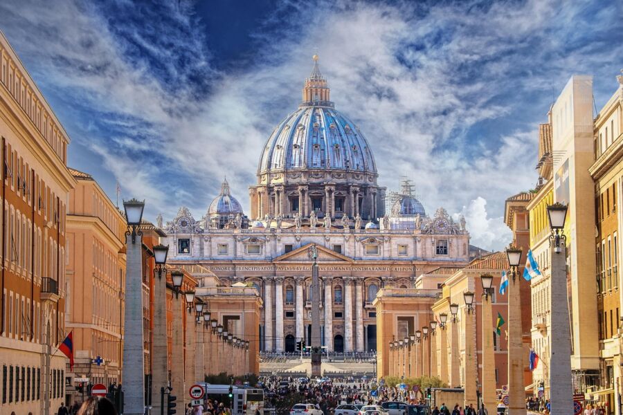 St. Peters Basilica in Vatican City, iconic Renaissance architecture, bustling tourist destination.