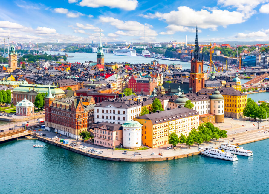 Aerial perspective of Gamla Stan, Stockholm's old town, featuring its charming buildings and cobblestone streets from City Hall