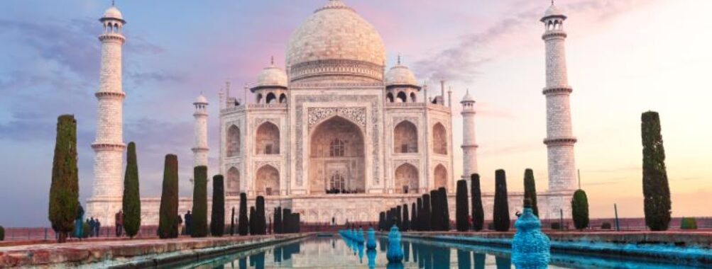 Taj Mahal at sunset with reflection in water