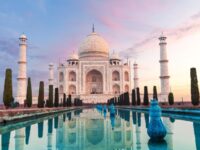 Taj Mahal at sunset with reflection in water