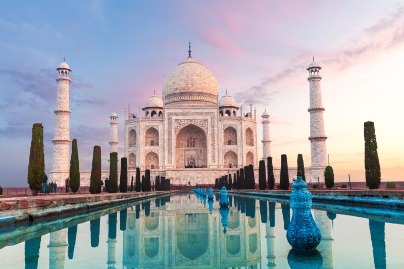 Taj Mahal at sunset with reflection in water