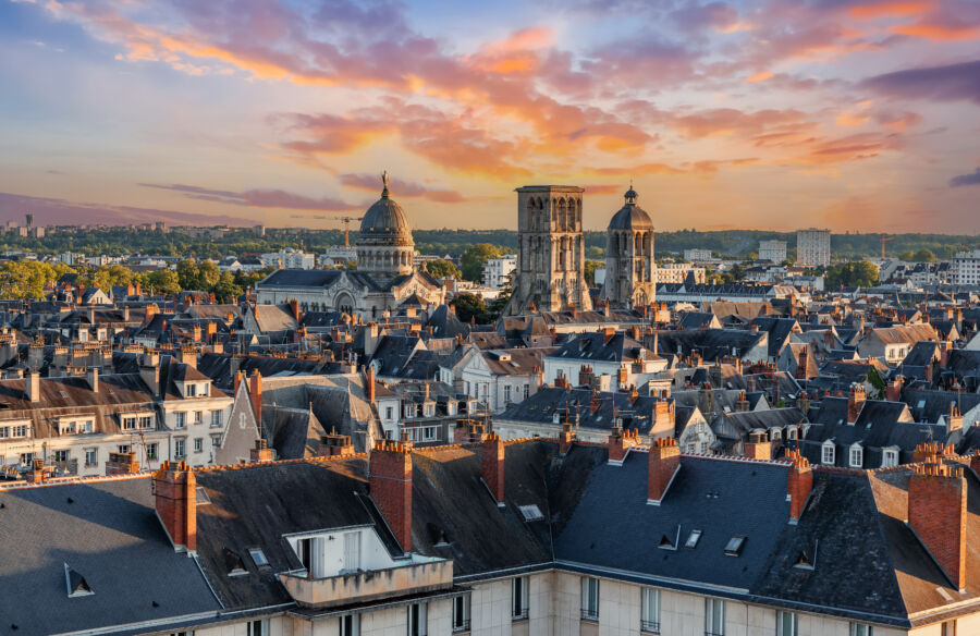 Aerial view of the Loire Valley, France, bathed in warm sunset light, showcasing its beautiful architecture