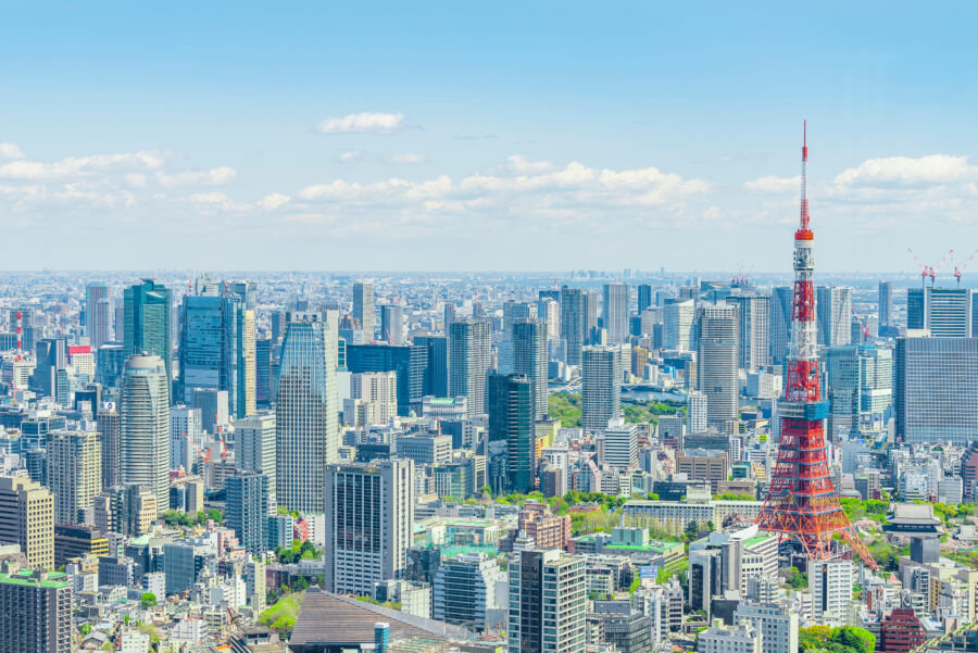 Tokyo skyline features a blend of modern skyscrapers and traditional architecture, representing Japan's dynamic cityscape