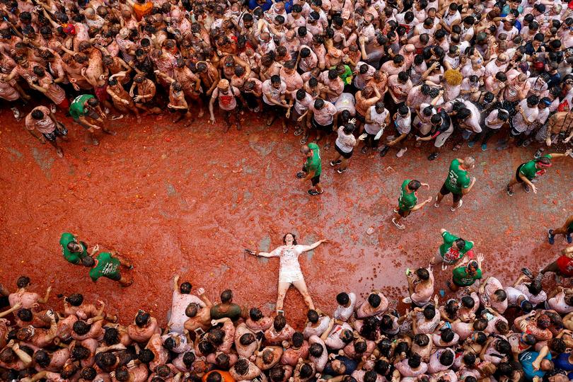 La Tomatina 2024: Joyful tomato fight in Buñol, Spain.