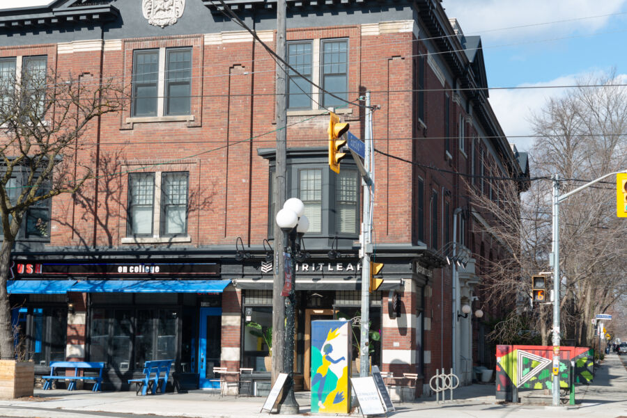 Facade of the apartment building at 542 College Street, situated at the intersection with Euclid Avenue in Toronto's Little Italy