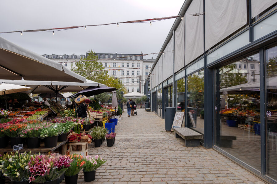 Outdoor scene showcasing the Torvehallerne, a popular marketplace in Copenhagen