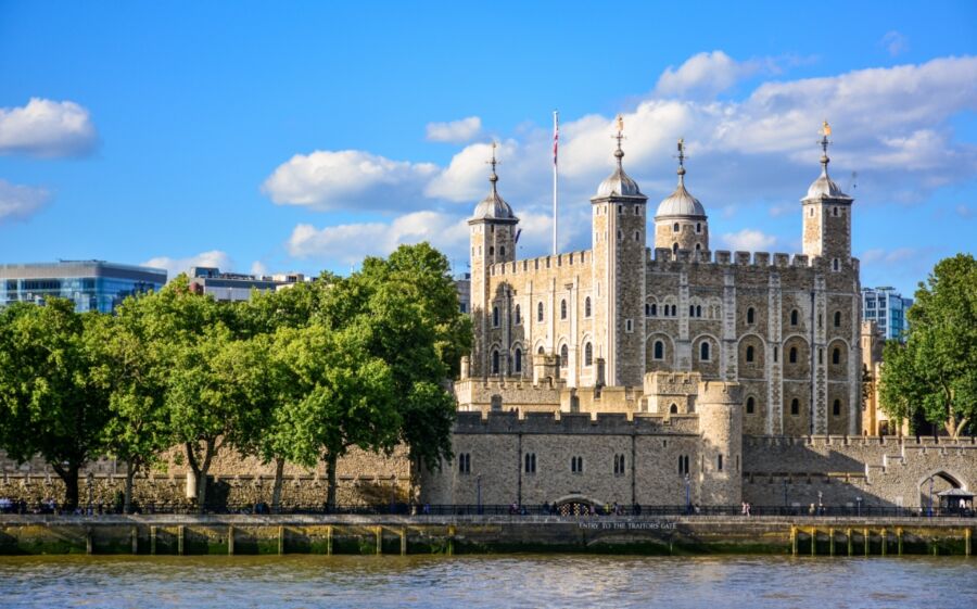 The iconic Tower of London, a significant castle and former prison, prominently located in London, England