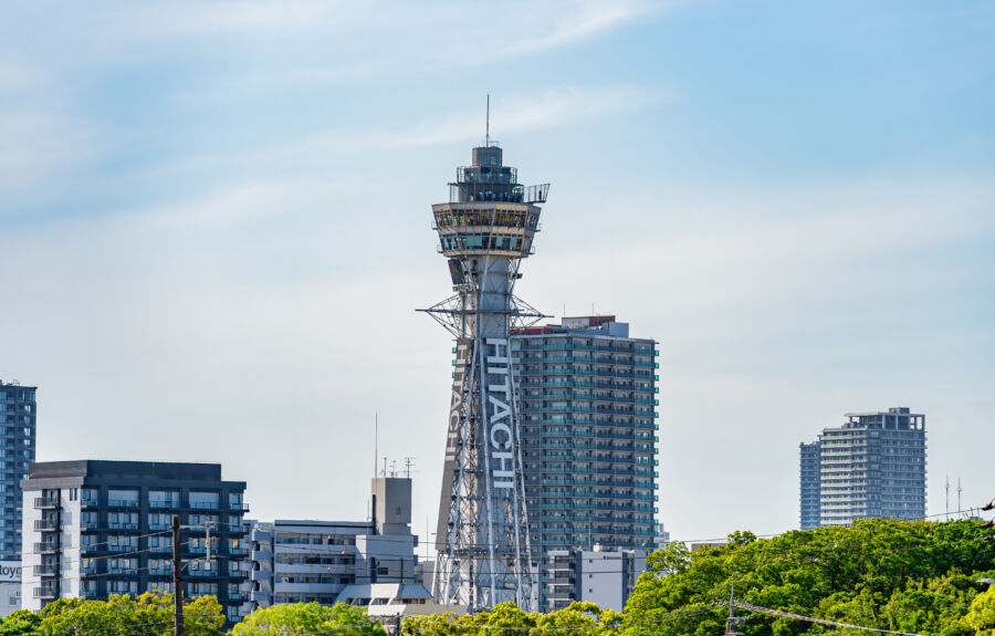 Iconic Tsūtenkaku Tower stands tall in Osaka's Shinsekai district, highlighting the city's unique architectural heritage