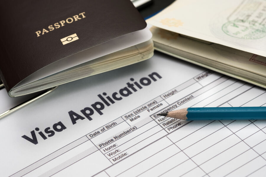 Close-up of a visa application form, highlighting details for immigration travel preparation