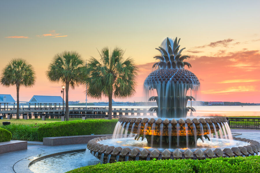 Scenic sunset at Waterfront Park, Charleston, South Carolina, highlighting a fountain with colorful skies in the background