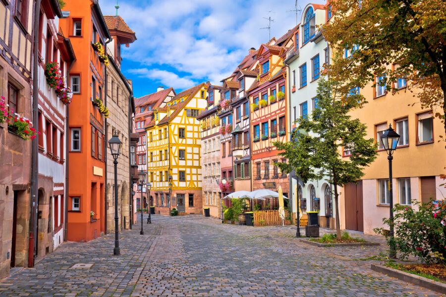 Scenic view of Weissgerbergasse, a historic street in Nuremberg's old town, featuring traditional buildings and a picturesque atmosphere