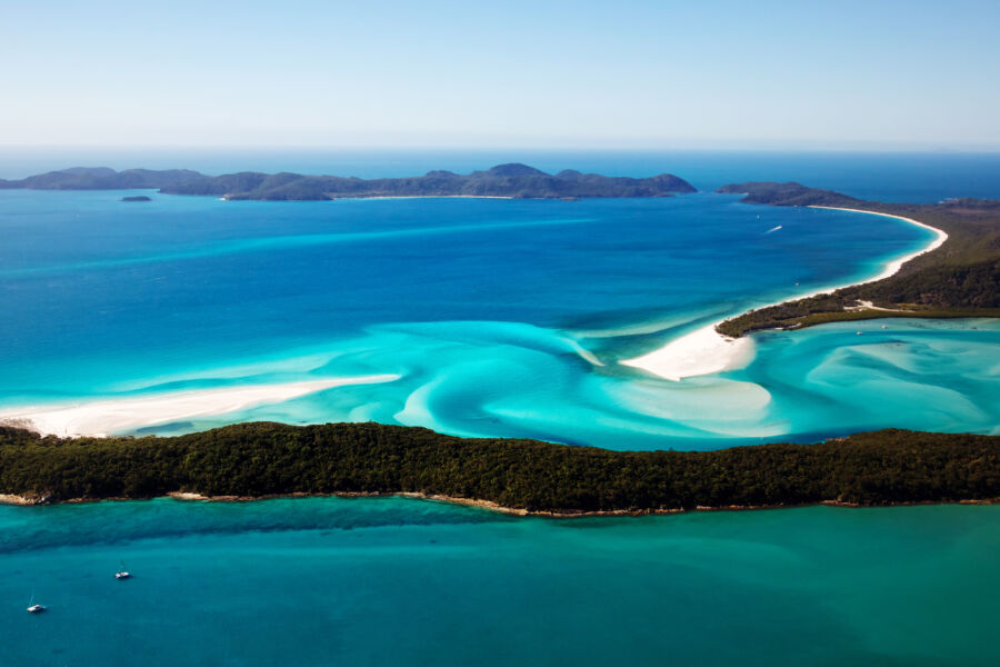 Stunning aerial perspective of Whitehaven Beach, highlighting its beautiful white sands and clear blue waters in the Whitsundays